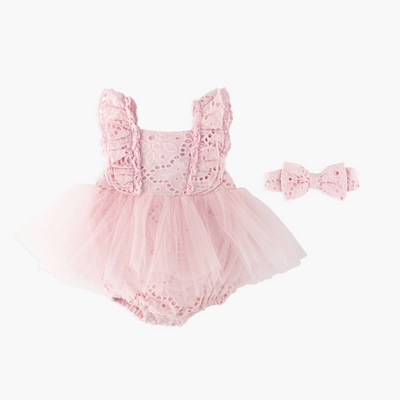 front shot of pink dress and bow
